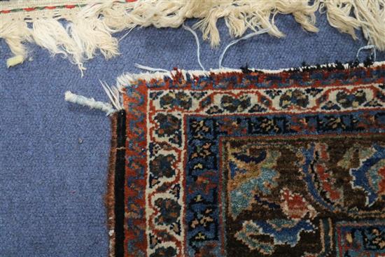 A Persian blue ground carpet 215cm x 155cm